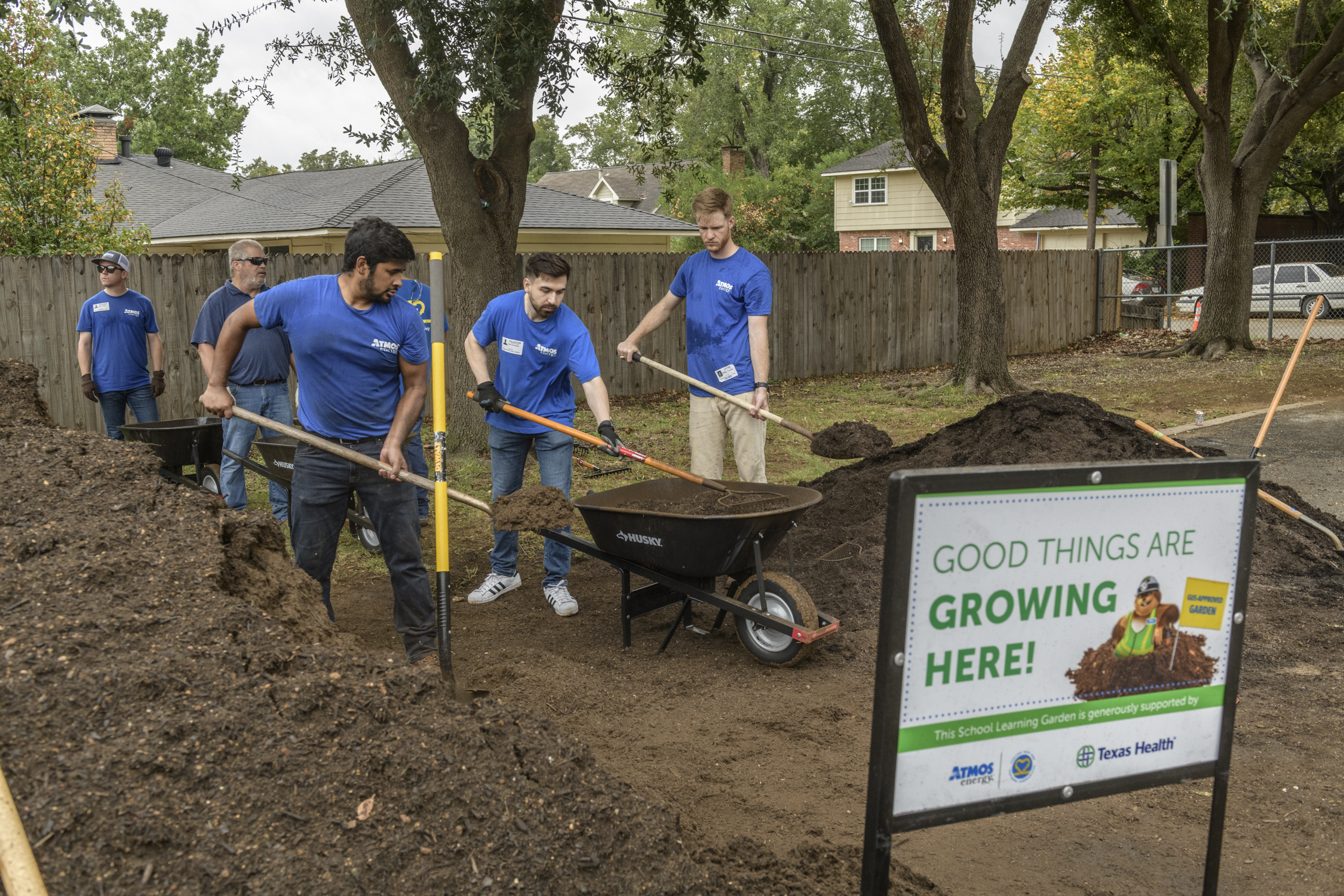 Volunteers Dig in to Build School Learning Garden at Wimbish
